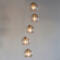Satin Brass 5 Light Adjustable Height Ceiling Pendant Fitting With Dimpled Glass Shades - 5 Light Fitting